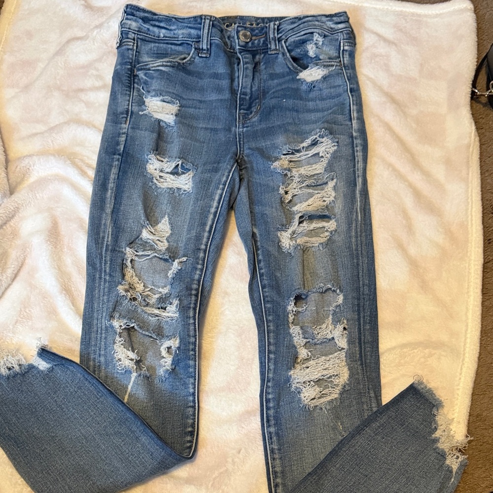 American Eagle Outfitters Ripped Blue Hi-Rise Jegging Jeans